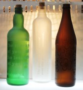 Sand-blasted, upcycled bottle product